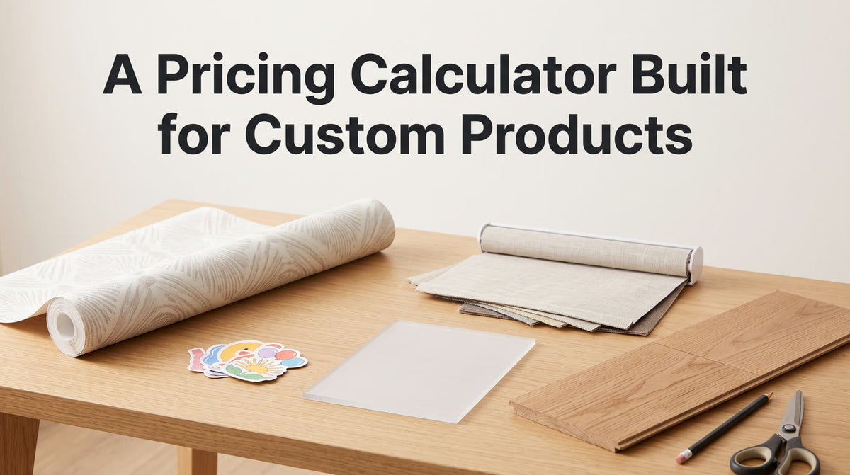 Headline A Pricing Calculator Built for Custom Products over a light oak table with wallpaper, vinyl stickers, an acrylic sign blank, blind fabric swatches and a wood flooring plank